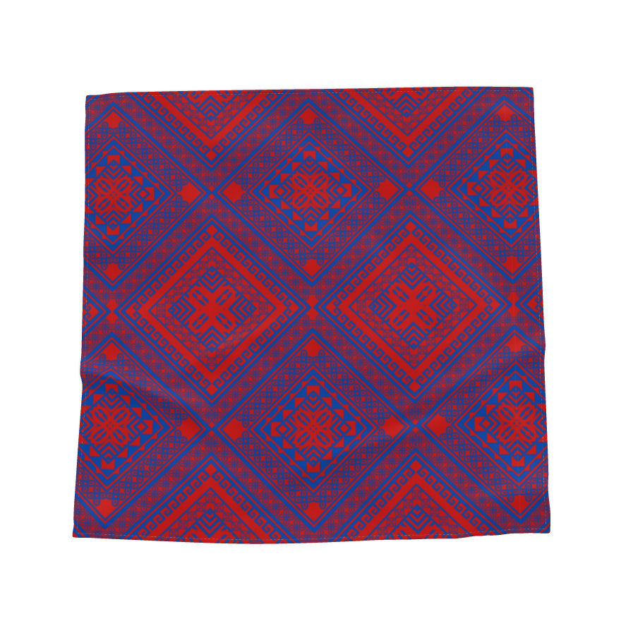 KAHINDO Adinkra Diamond Silk Scarf – flat lay showing geometric tile print in crimson and cobalt