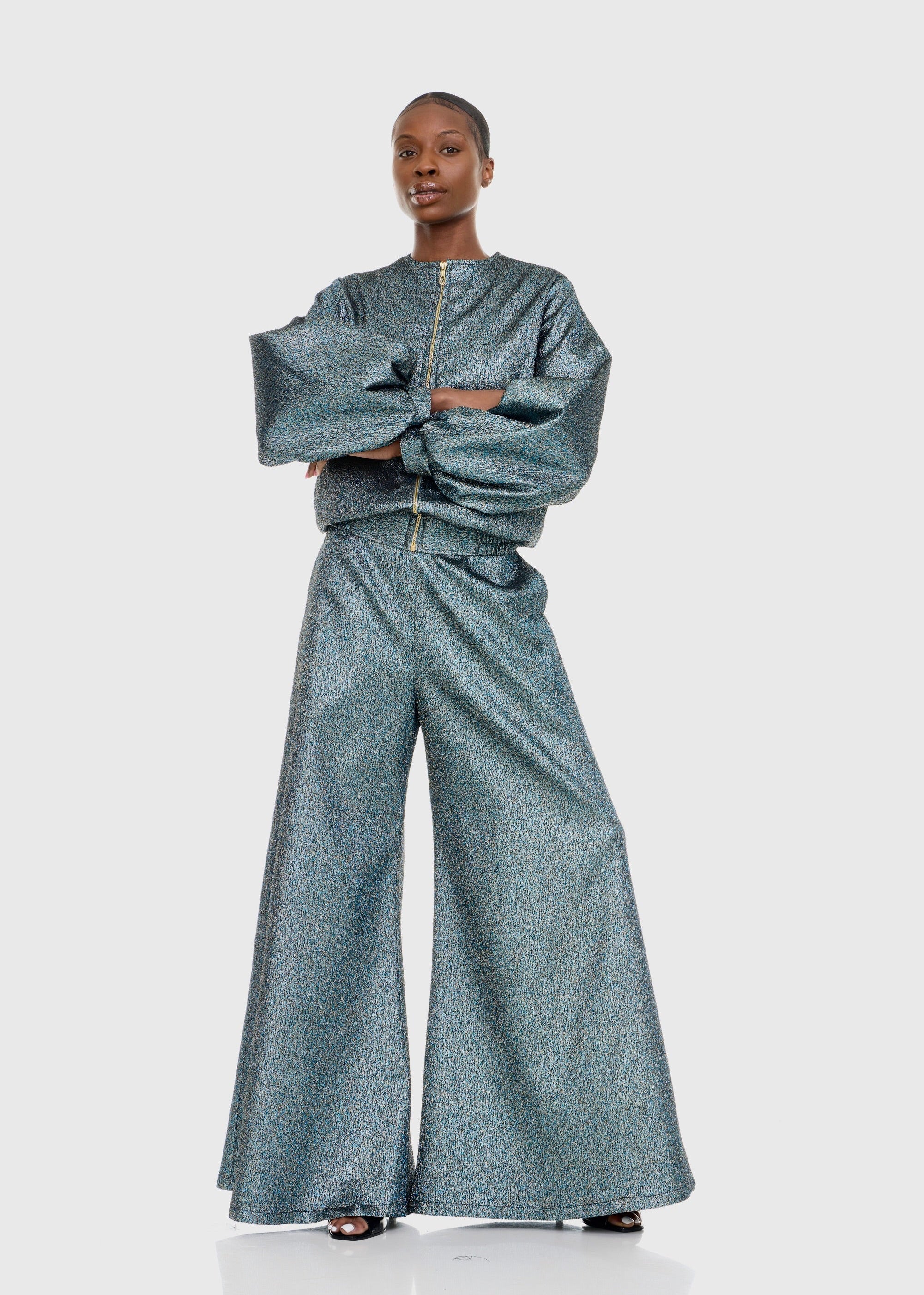 Black woman wearing Strapless Green Shimmer Flared Pants
