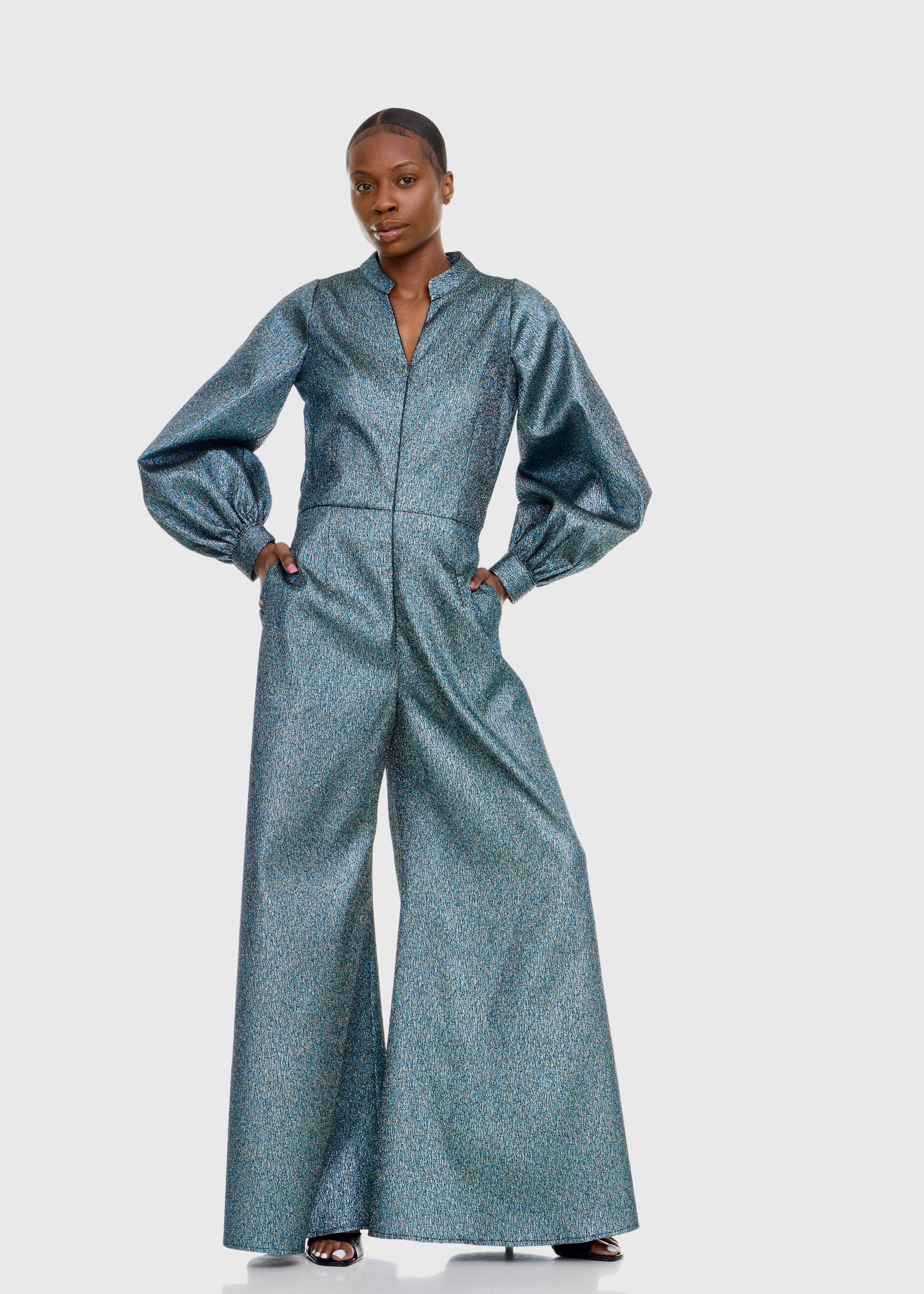 Black woman wearing Green Shimmer Jumpsuit