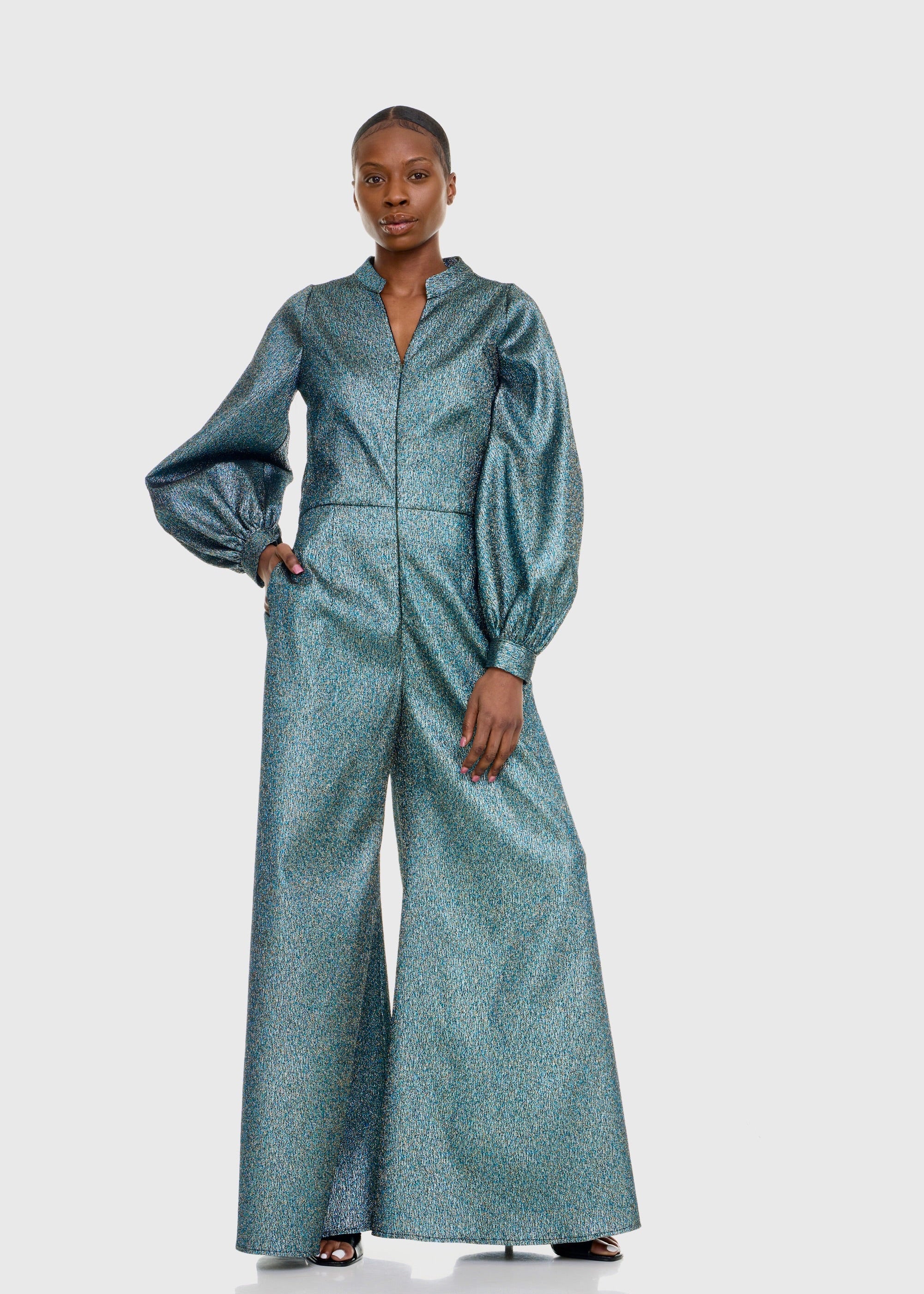 Black woman wearing Green Shimmer Jumpsuit