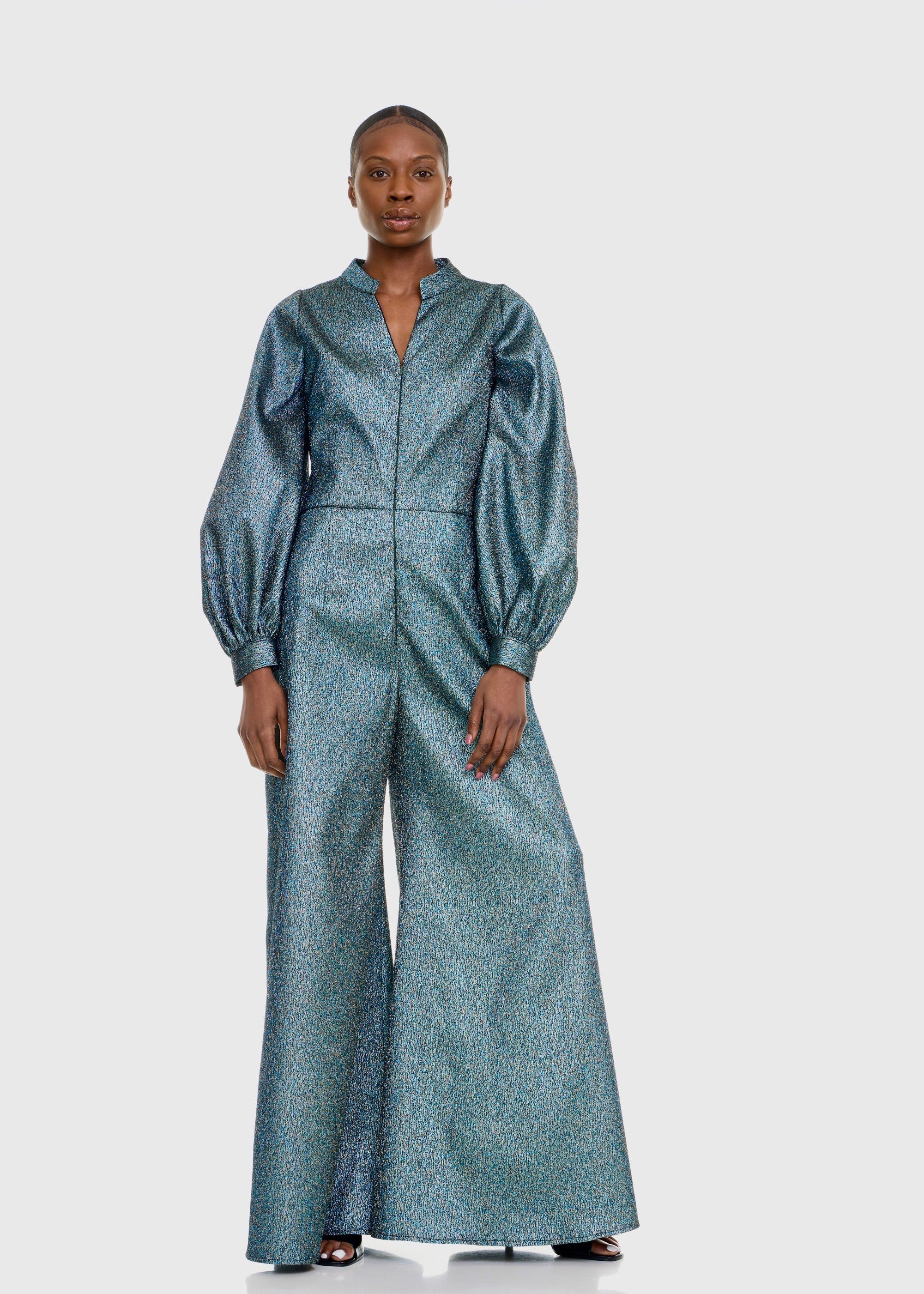 Black woman wearing Green Shimmer Jumpsuit