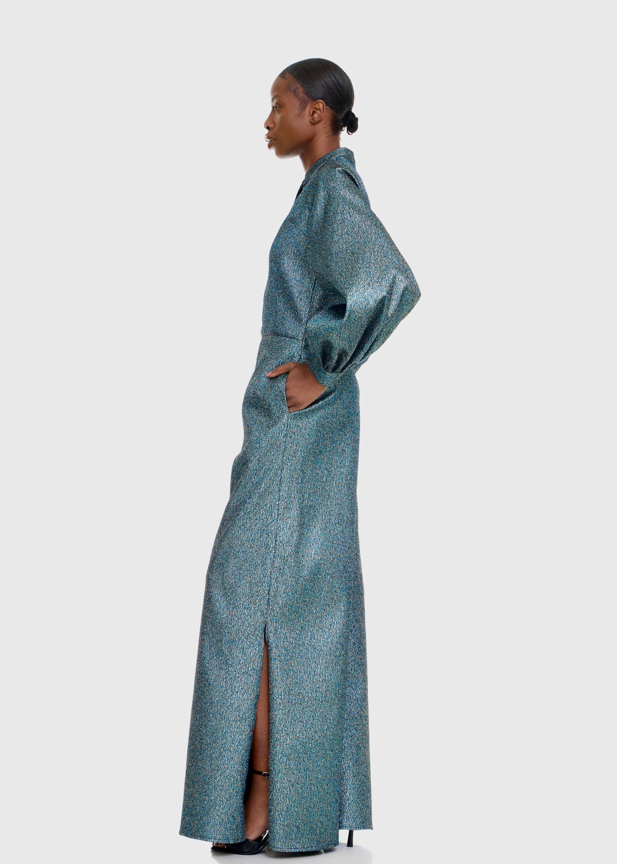 Black woman wearing Green Shimmer Jumpsuit