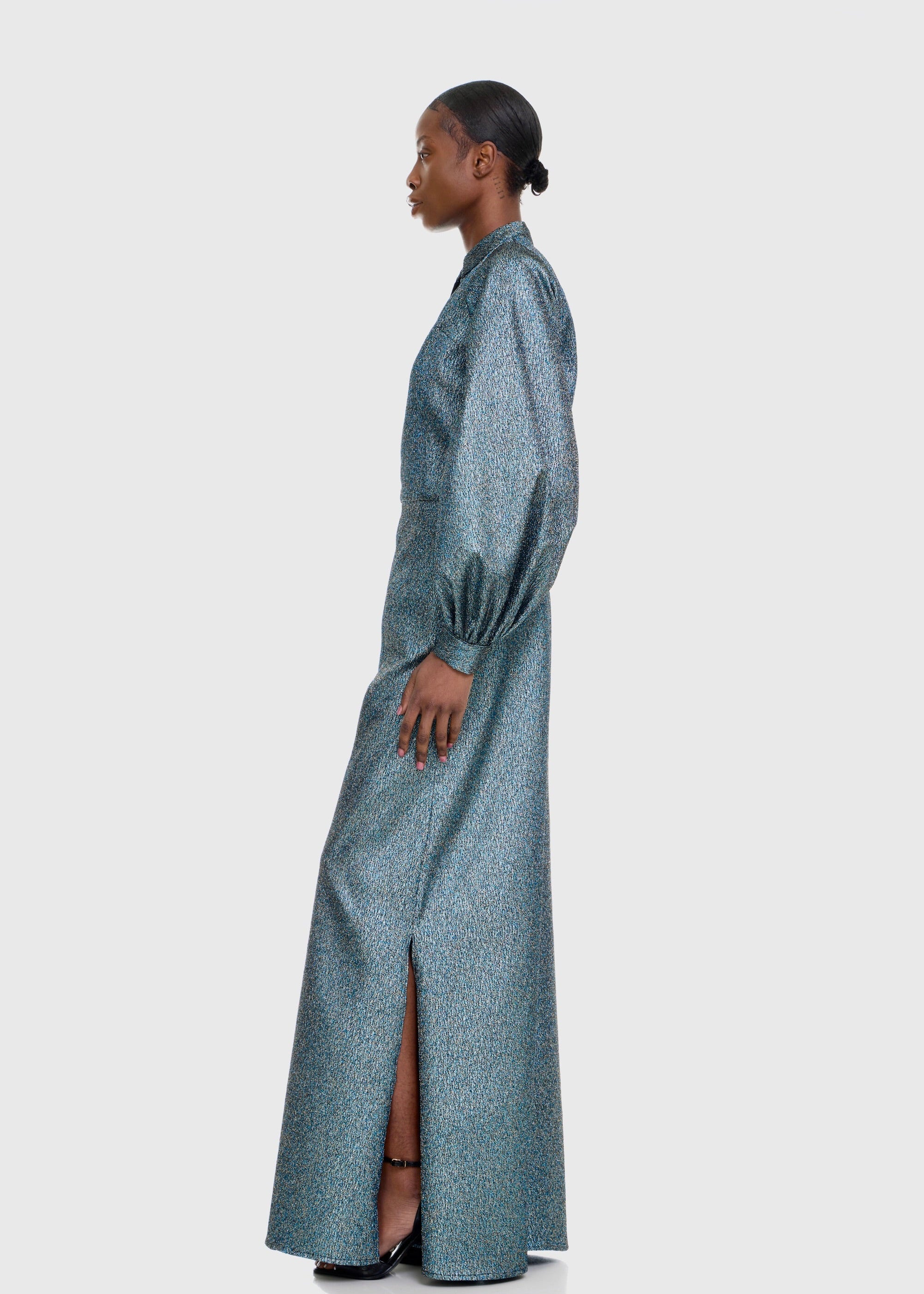 Black woman wearing Green Shimmer Jumpsuit
