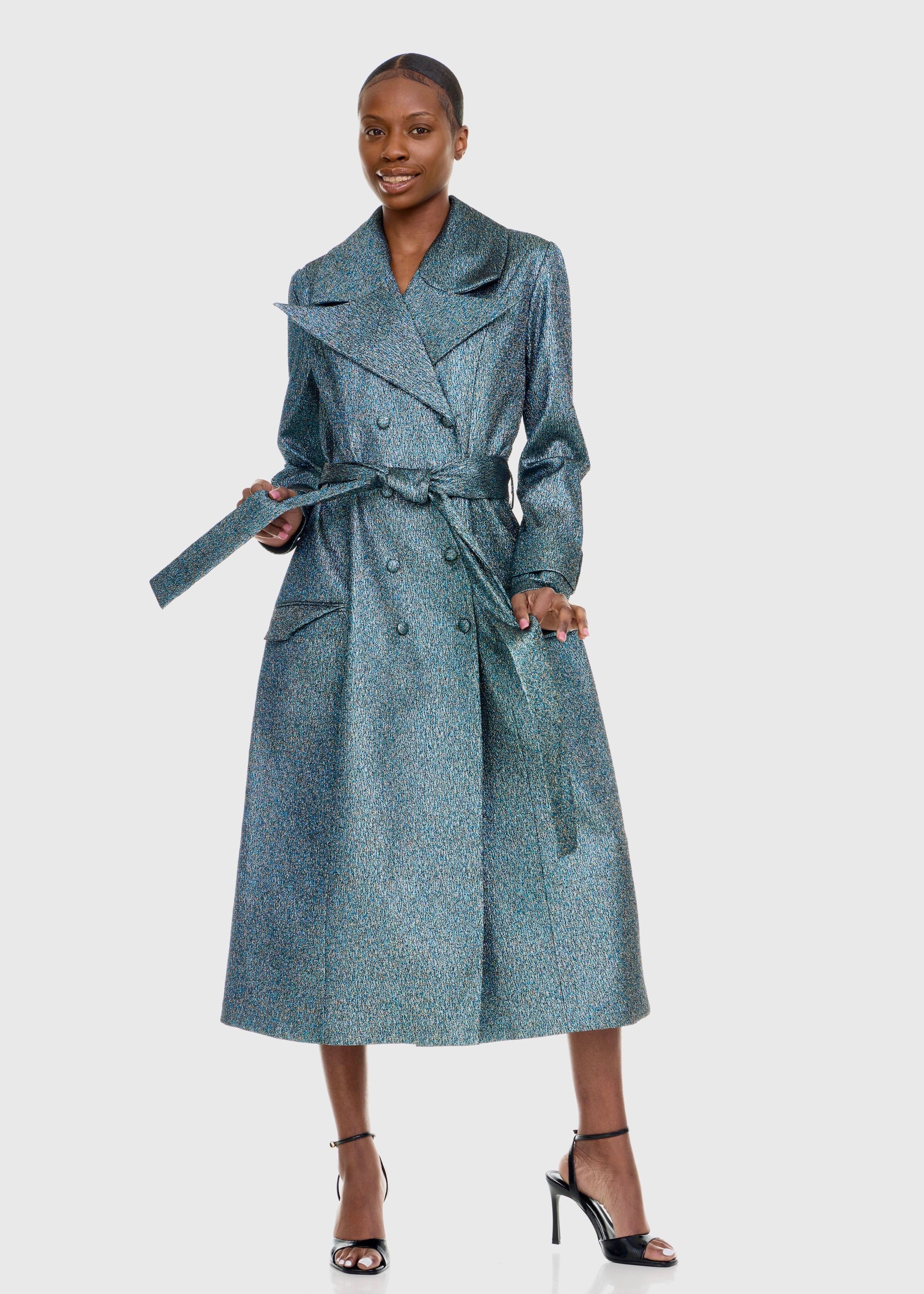 Black woman wearing Green Shimmer Trenchcoat