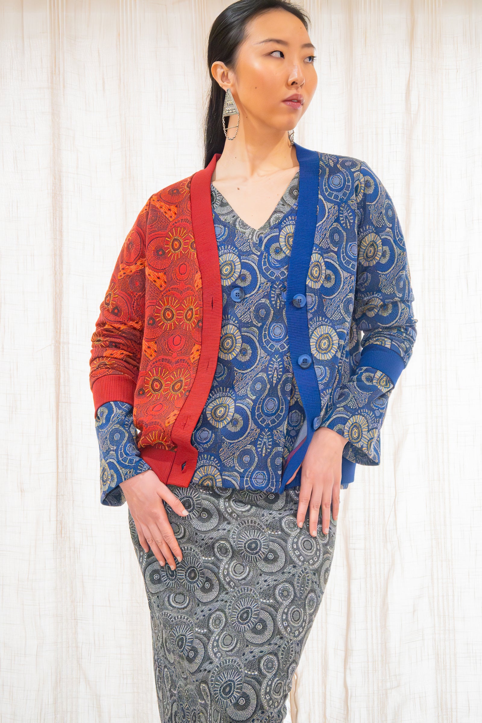 Asian woman wearing the Red & Blue Colorblock Jacquard Cardigan