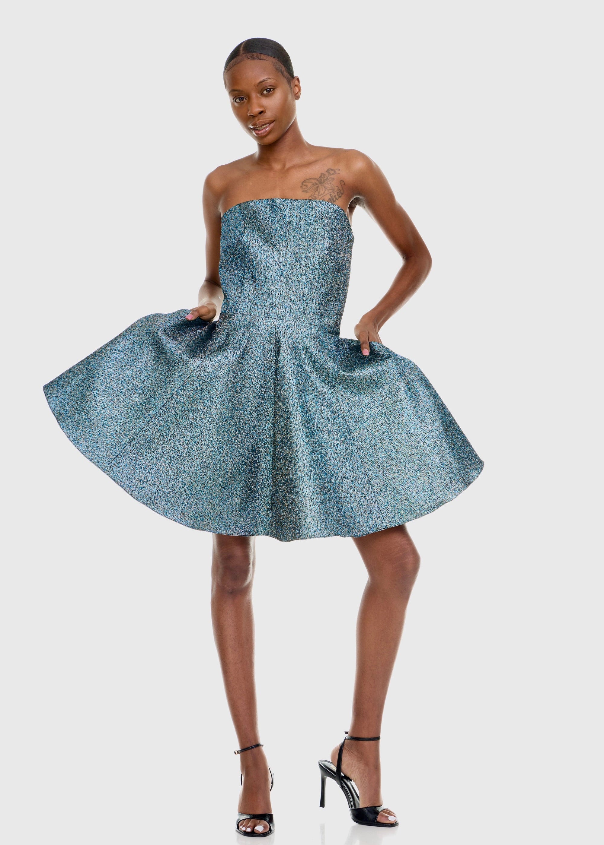 Black woman wearing Strapless Green Shimmer Mini dress