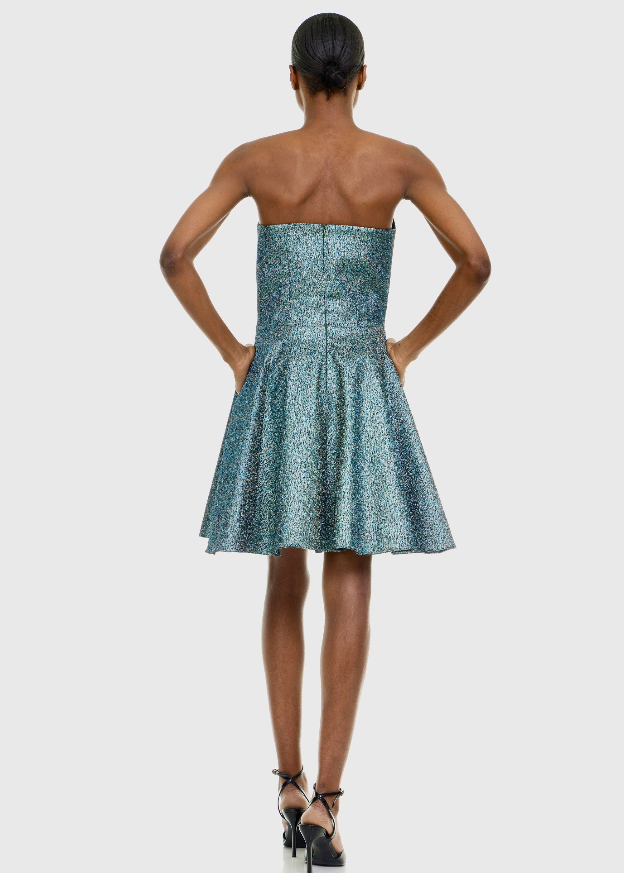 Black woman wearing Strapless Green Shimmer Mini dress