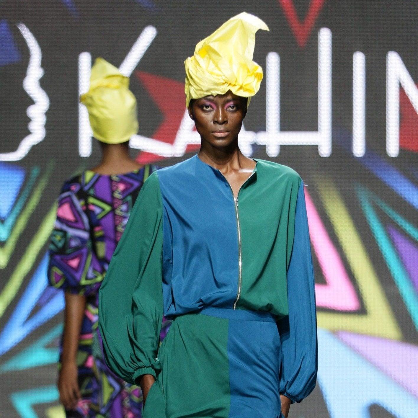 Close-up of the color block bomber jacket's texture and colors on a plain background