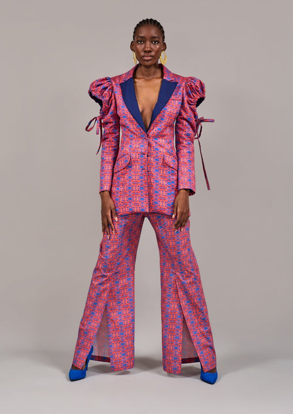 Model in a wide stance wearing the matching set: Capetown Tuxedo Jacket and Bantry Slit Pants by KAHINDO