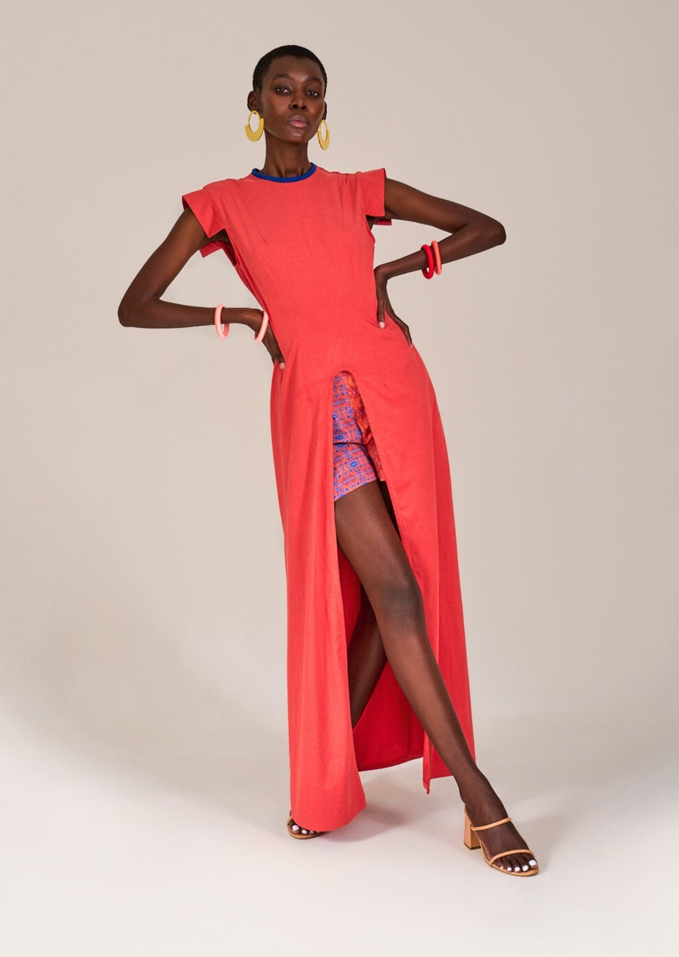 Model wearing the KAHINDO Franshook Long Tunic with hands on waist