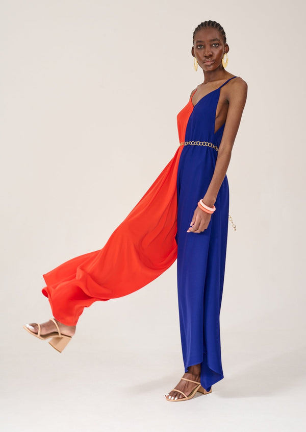 Model posing on one leg to show the trouser details of the KAHINDO Longstreet Colour Block Jumpsuit