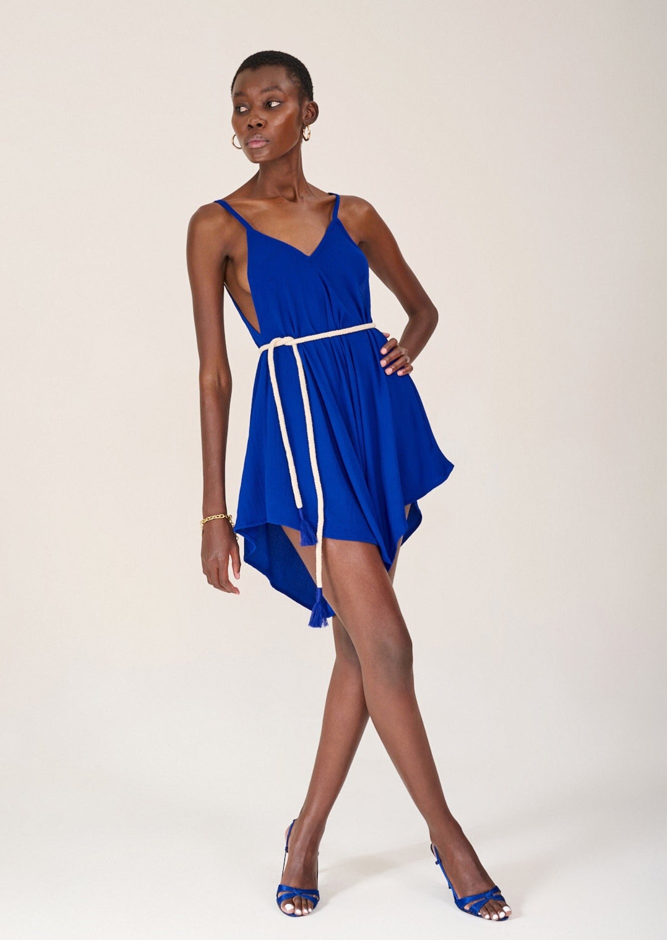 Model posing with hands on hips wearing the KAHINDO Kloofstreet Playsuit