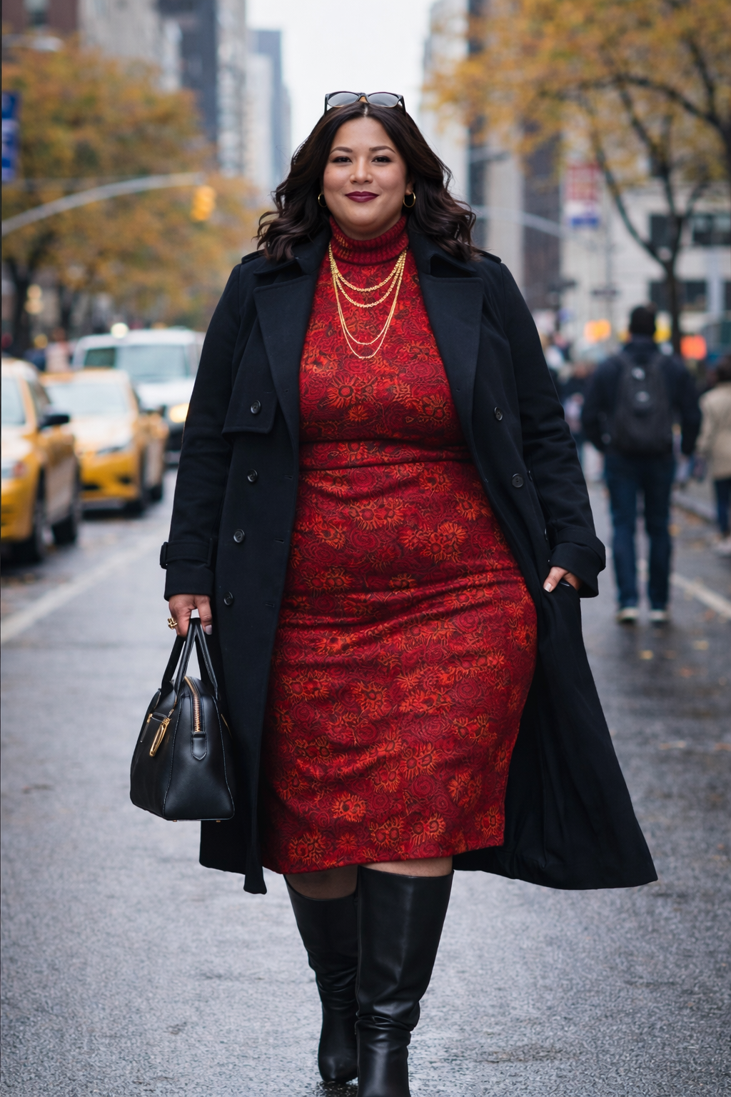 Plus-size model wearing the Algiers turtleneck dress and black coat, walking in a busy city street with taxis and autumn trees in the background.