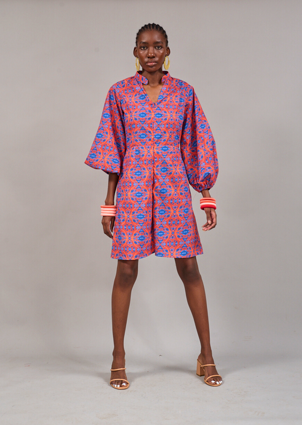 Model facing forwards in a wide stance wearing the KAHINDO Claremont Romper