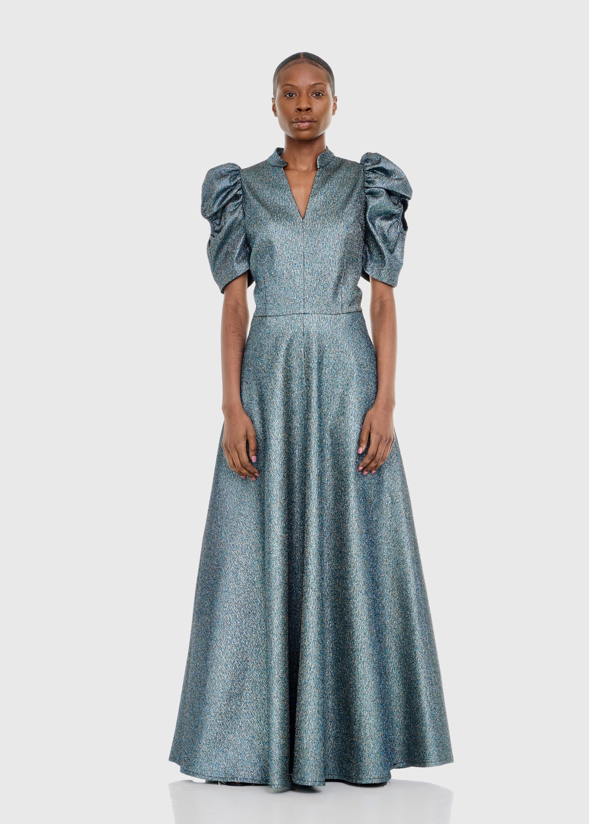 Black woman wearing Green Cleopatra Dress