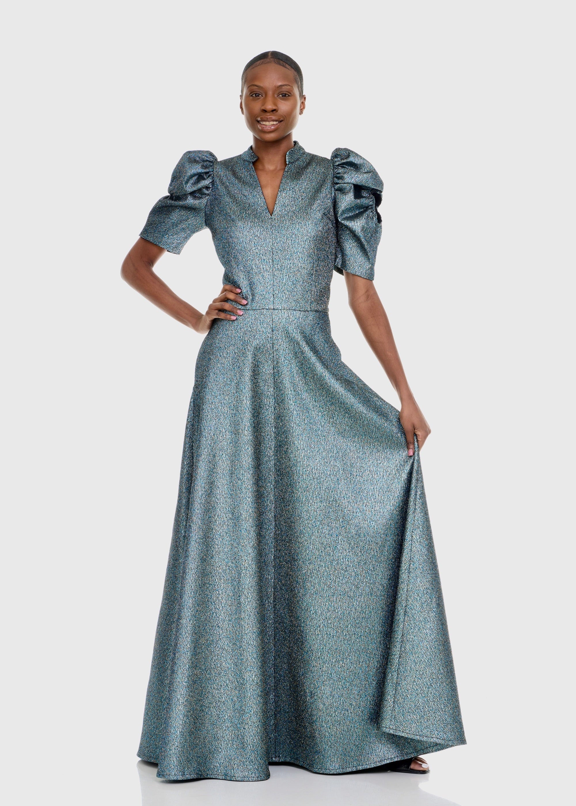 Black woman wearing Green Cleopatra Dress