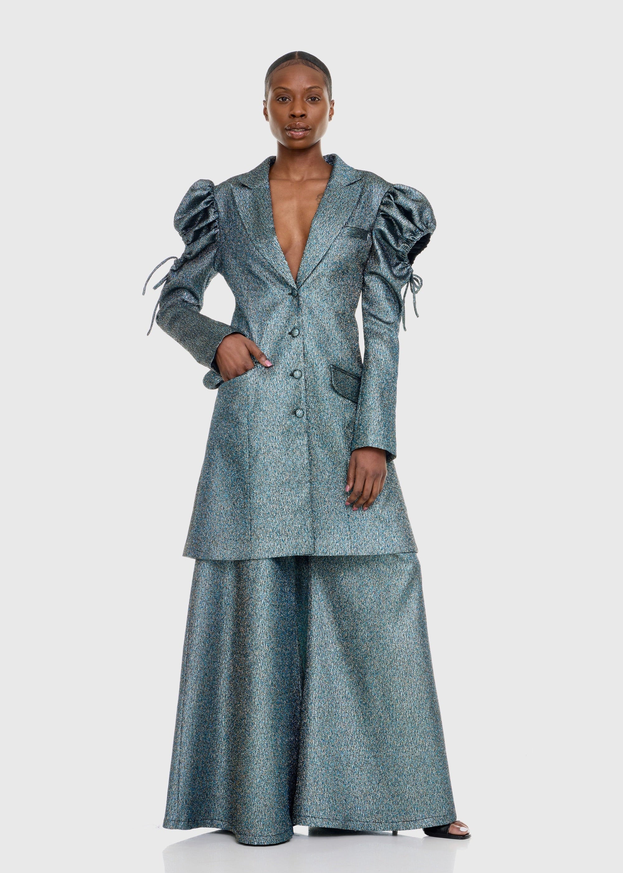 Black woman wearing Strapless Green Shimmer Flared Pants