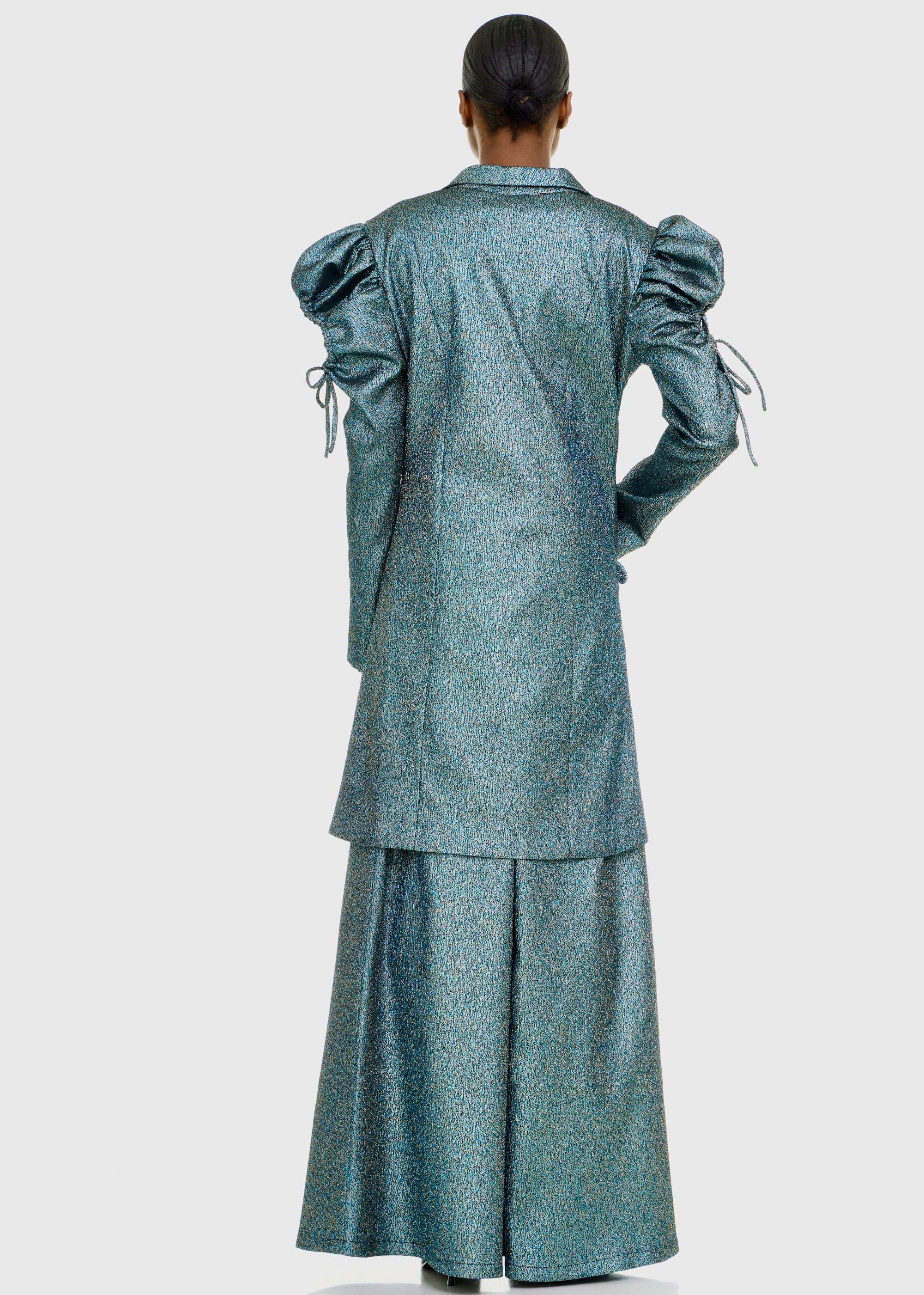 Black woman wearing Strapless Green Shimmer Flared Pants