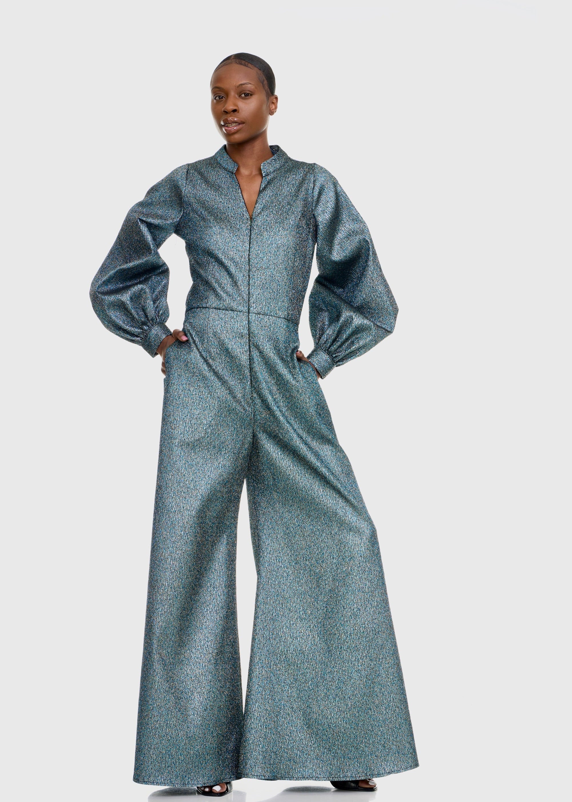 Black woman wearing Green Shimmer Jumpsuit
