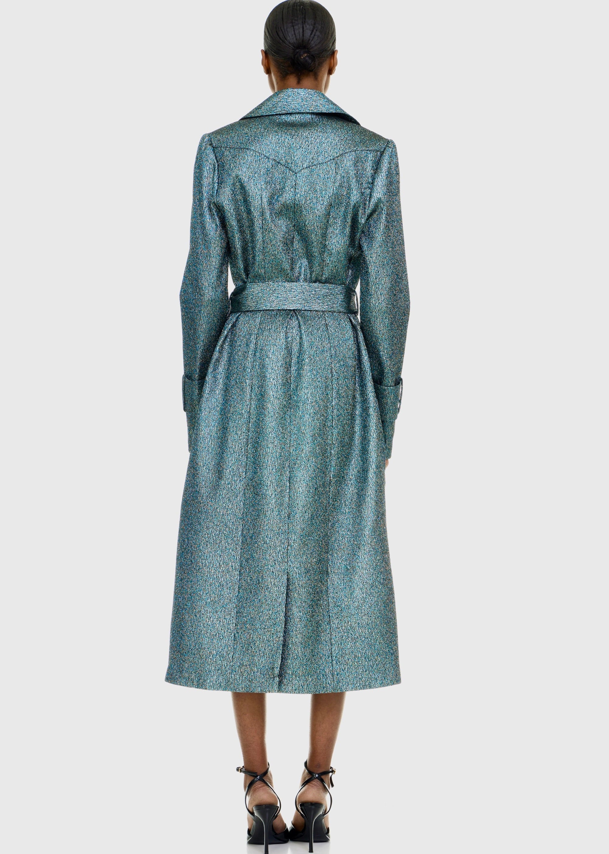 Black woman wearing Green Shimmer Trenchcoat