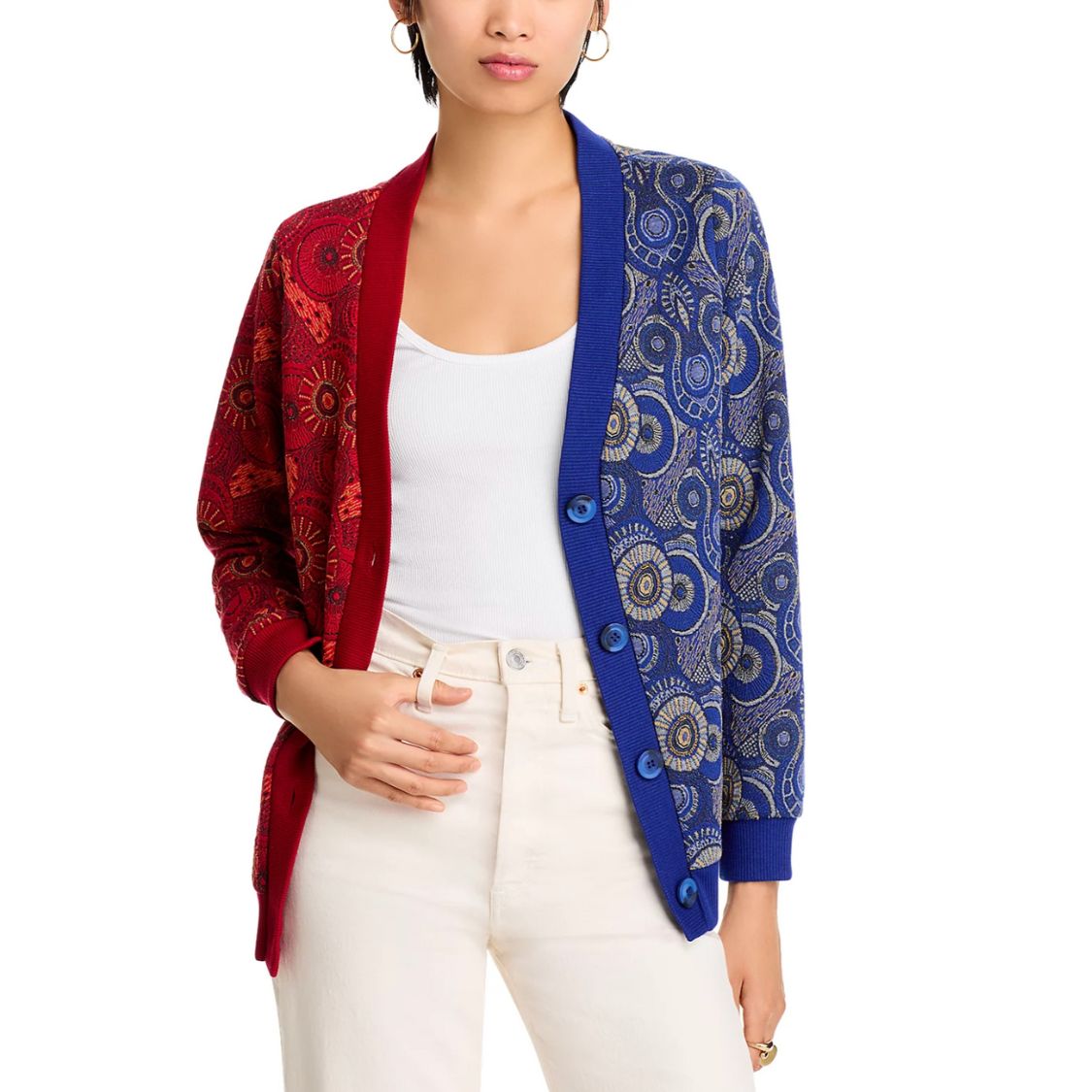 Closeup of woman wearing Red & Blue Colorblock Jacquard Cardigan with white jeans
