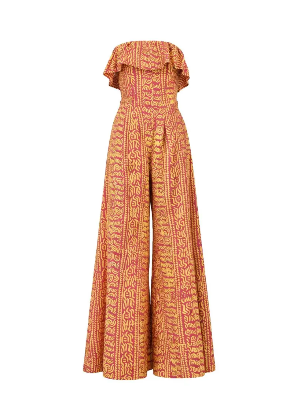A model wearing the Senegal Jumpsuit in a vibrant pink and yellow print.