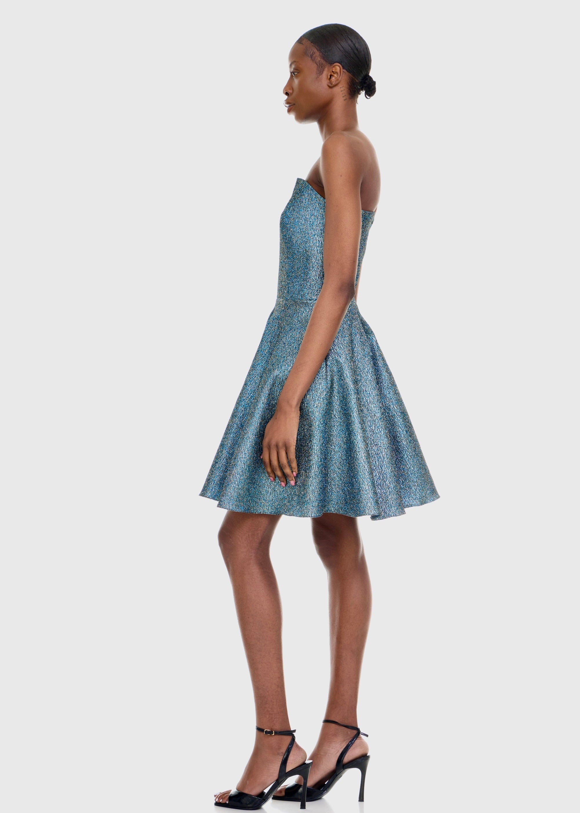 Black woman wearing Strapless Green Shimmer Mini dress