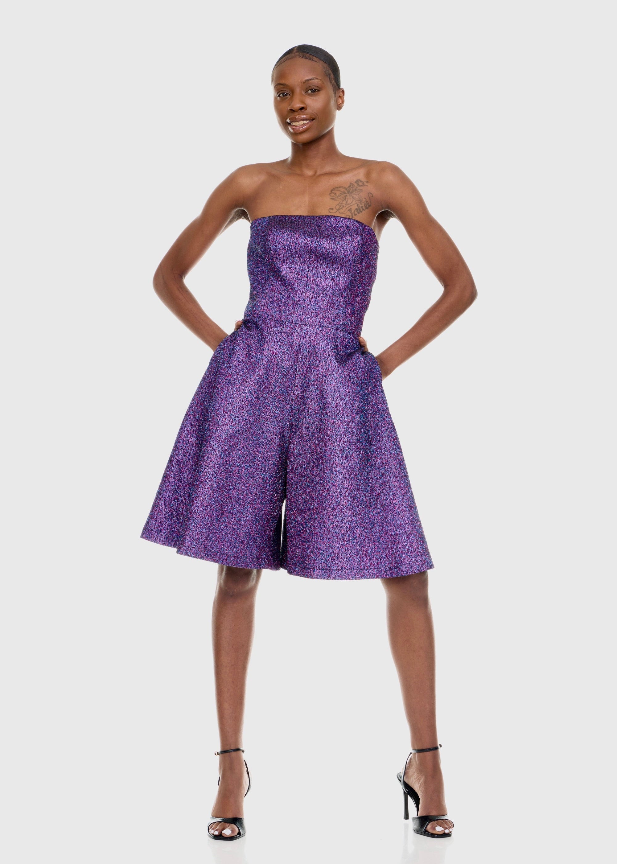 Black woman wearing Strapless Purple Shimmer Romper