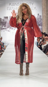Front view of the Ayaan Duster in red with intricate black detailing