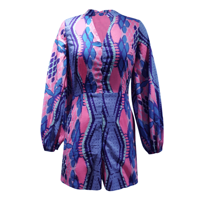 The Kisumu Romper featuring a blue and pink print design for women