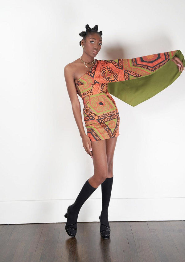 The Kivu Dress being worn by a model striking a pose