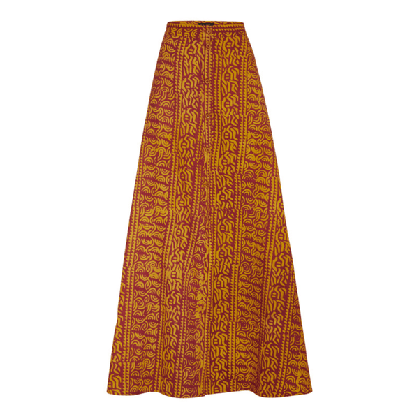 The Praslin Maxi Skirt featuring an orange and yellow pattern