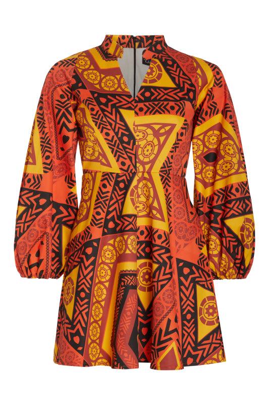 The Rukwa Dress featuring an orange and black geometric pattern