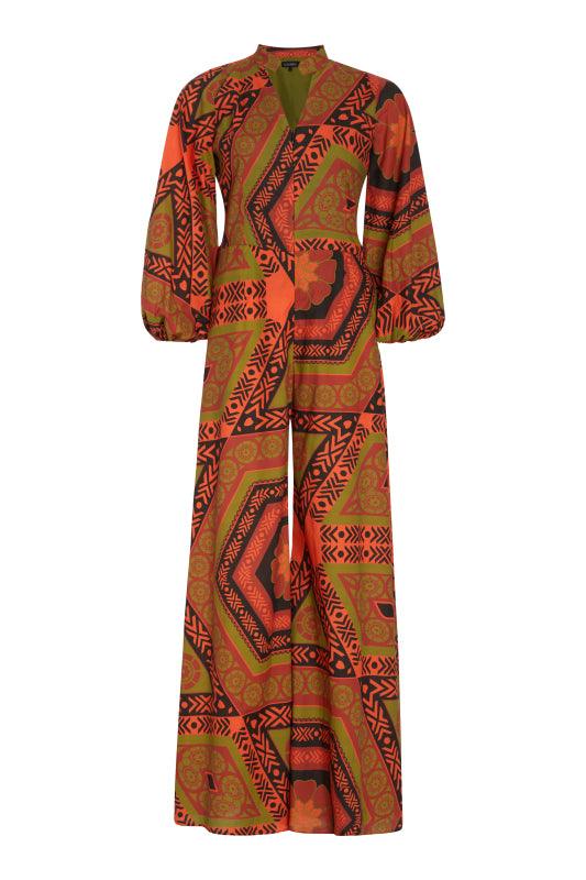 Front view of the Sondu Jumpsuit featuring an orange and black pattern made from a cotton blend