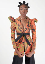 A model wearing the Tanganyika Jacket with African-inspired print
