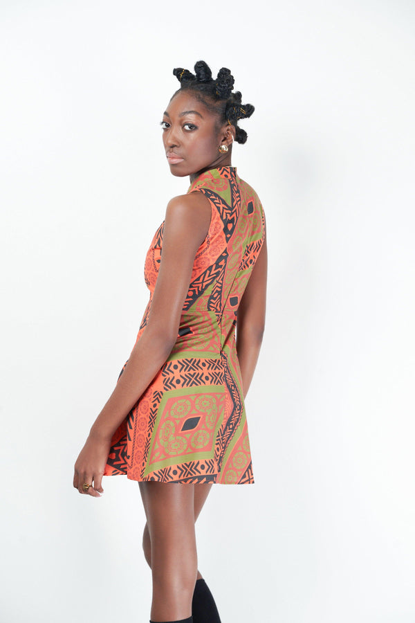 model showing the back of an african inspired print dress
