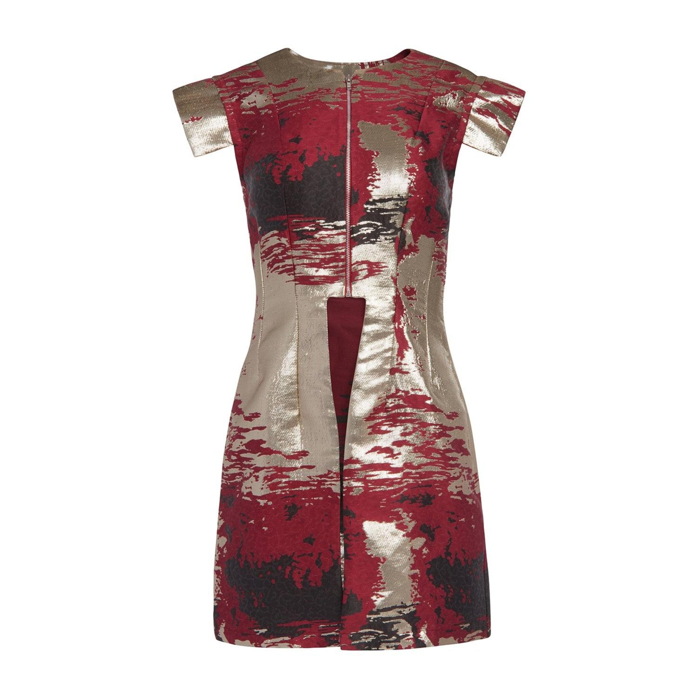 The Ada Tunic featuring a metallic print on a red and black fabric