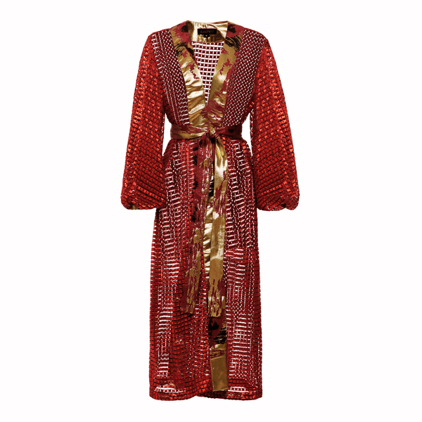 Ayaan Duster featuring red fabric with gold and black ornamental patterns