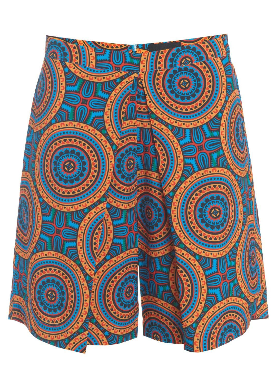 Detail of the Fiesta Shorts fabric featuring orange and blue patterns