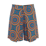 Detail of the Fiesta Shorts fabric featuring orange and blue patterns