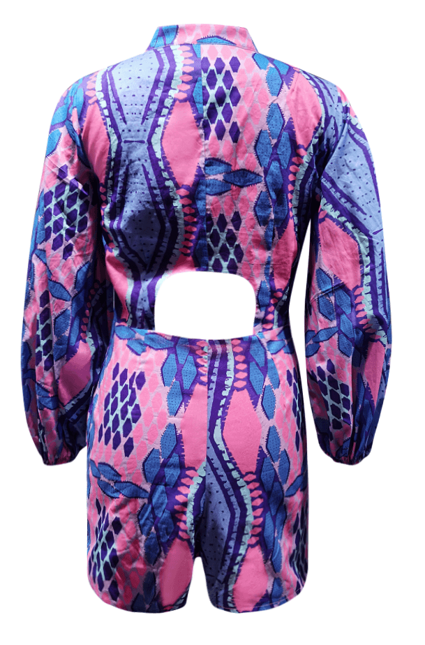 Rear angle of the Kisumu Romper with pink and blue patterns