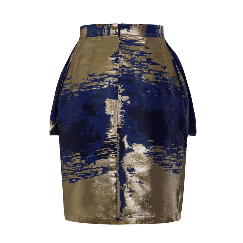 Close-up of Makena Mini Skirt with blue and gold pattern