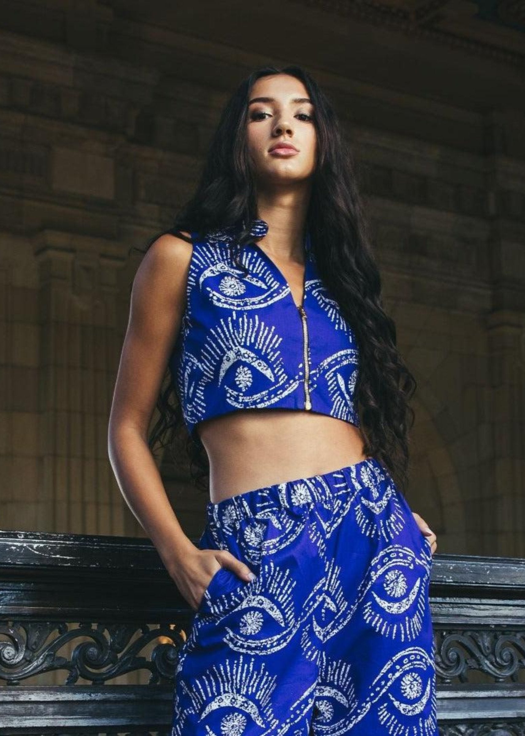 Close-up of Wasini Crop Top with blue and white design paired with matching pants