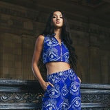 Close-up of Wasini Crop Top with blue and white design paired with matching pants